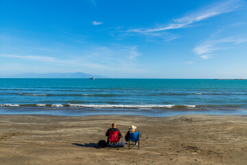 Fototapeta na wymiar family on the beach