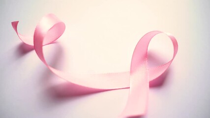 Pink silk ribbon, Symbol of world breast cancer awareness month in october.