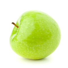 Green apple on a white background with a shadow.