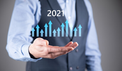 holding financial chart graph 2021