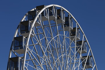 Ferris wheel booths against the sky