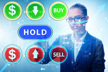 Concept of commercial choices between buying holding and selling