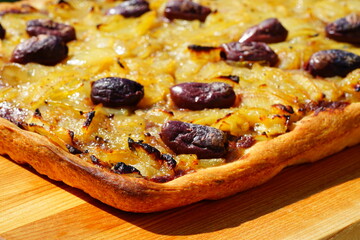 A French pissaladiere tart with onions and black olives