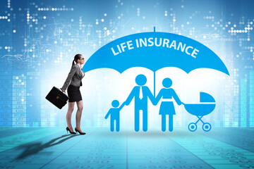 Life insurance concept with family under umbrella