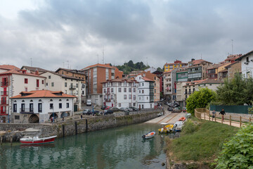 Fototapeta na wymiar Harbor scene in the Basque fishing village of Mundaka in Basque Country, Spain