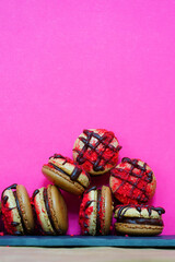 Chocolate raspberry macaron cookies filled with chocolate ganache