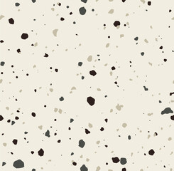 Seamless pattern of terrazzo texture, isolated on a beige background. Abstract pattern in black and grey colors. Trendy background for web and print design.