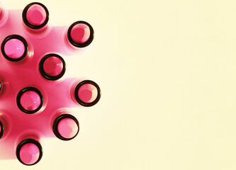 Colorful lipsticks on bright background