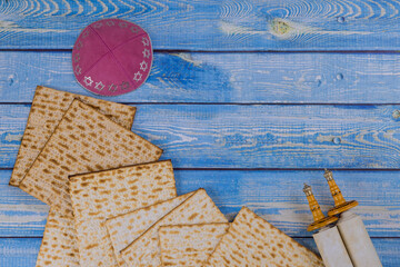 Jewish holiday passover with jewish unleavened bread matzah and torah