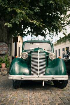Green vintage car on cobbled street, Barrio Historico (Old Quarter), Colonia del Sacramento, Colonia, Uruguay