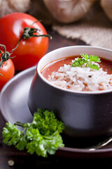 Tomato soup with rice with fresh parsley