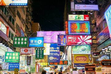 Abundant illuminated neon signs at night, Hong Kong, China