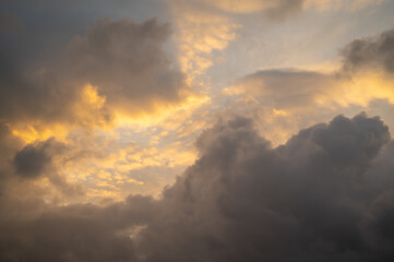 sunrise sky very cloudy with warm and soft light. skies