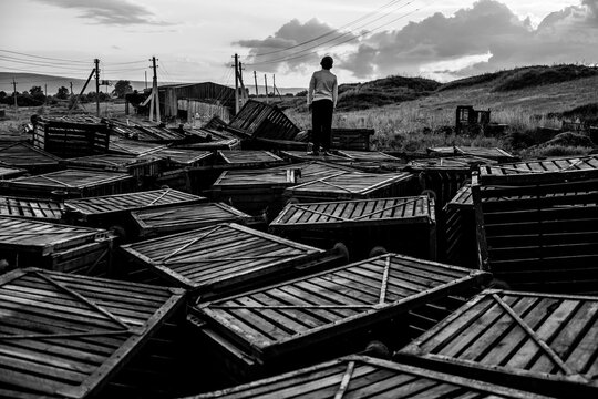 Boy on wooden crates, Ural, Sverdlovsk, Russia