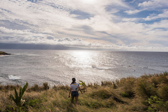 Woman looking at sea, Hookipa Beach, Maui, Hawaii