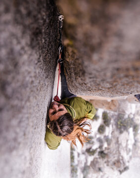 Climber trad climbing, Pine Creek, Bishop, California, USA