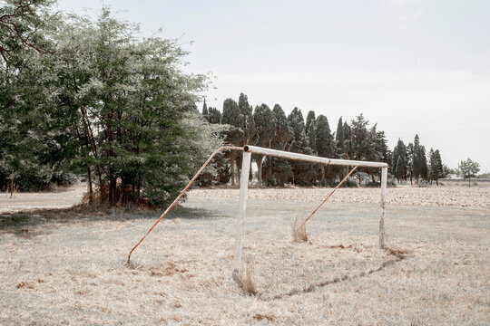Broken football goalpost, Tuscany, Italy