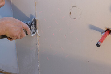 Cutting gypsum plasterboard plaster hand sawzall tool