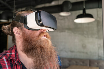 Male hipster using VR goggles