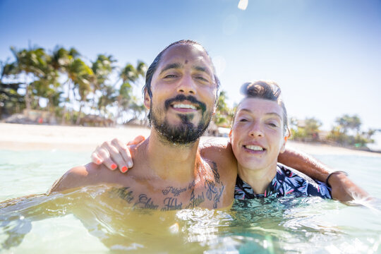 Couple enjoying sea, Pagudpud, Ilocos Norte, Philippines