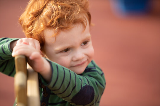 Portrait of boy with red hair