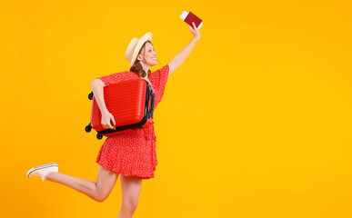 happy traveler young woman running merrily with suitcase