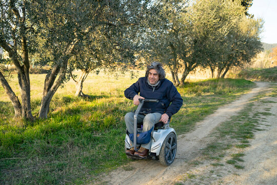 Man on wheels enjoying countryside