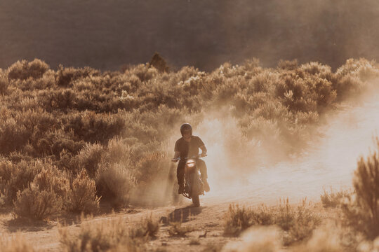 Motorbiker Raising Dust, Kennedy Meadows, California, US