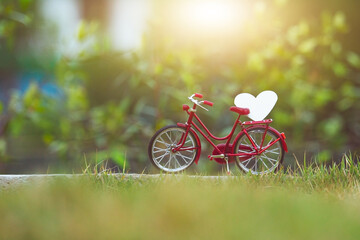 Red bicycle vintage in spring nature summer background copy spec, Red heart on bicycle