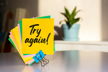 Try Again write on Sticky Notes.