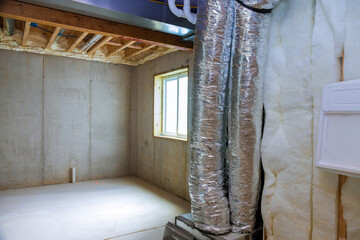 New home construction with installation of heating system in basement