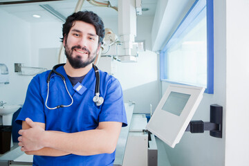 Young male radiographer in radiology department, portrait