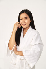 Beautiful girl wearing white bathrobe - obrazy, fototapety, plakaty