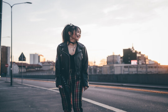  Young woman dressed in punk style, Milan, Italy