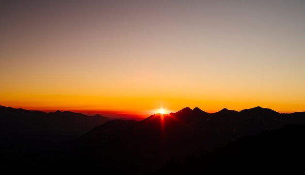 
Sunset over mountainscape, Bludenz, Vorarlberg, Austria