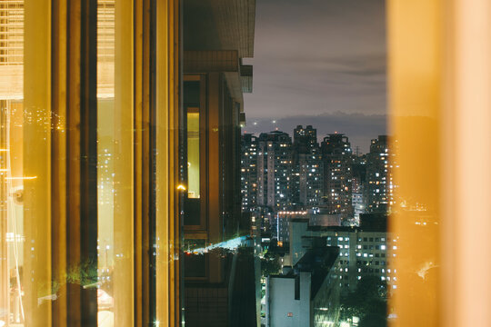 View of highrise buildings from window of apartment, Taipei, Taiwan