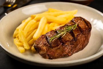Grilled steak with french fries.