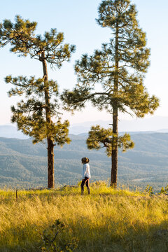  Woman enjoying sunset, Payson, Mogollon Rim, Arizona, United States