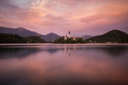 Aerial view of Bled Island with Church of the Assumption at dusk, Lake Bled, Upper Carniola, Slovenia 