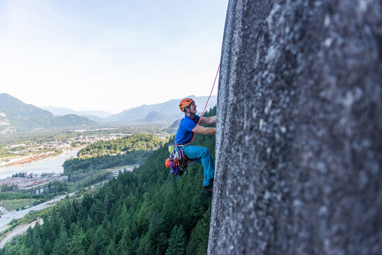 A climber traditional climbing  on granite, Tantalus Wall, Squamish