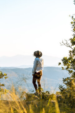 Woman enjoying sunset, Payson, Mogollon Rim, Arizona, United States
