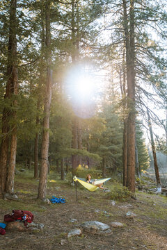  Woman swimming at sunset, Payson, Mogollon Rim, Arizona, United States
