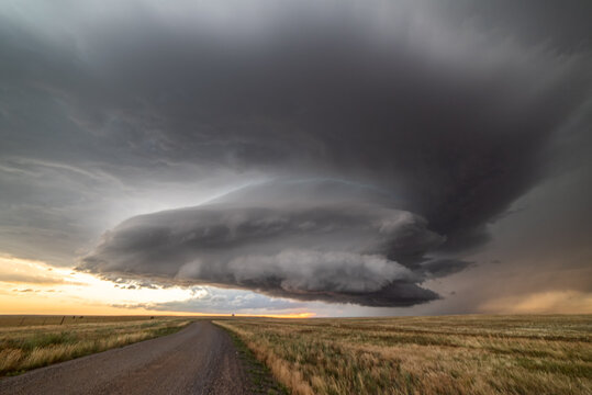 Incredible supercell spinning across Wyoming, sky full of dark storm clouds