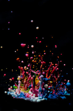 Paint Sculpture - High speed photography of splashes of multicoloured paint.