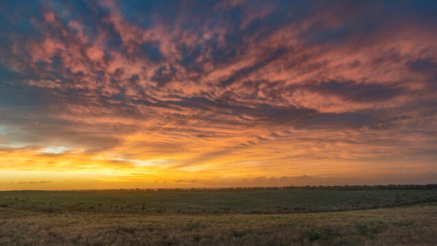 Gravity wave clouds in the sky at sunset 