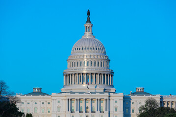 Obraz premium Washington, DC, USA - 27 April 2020: Close-up of the Cupola of the United States Capitol Building with blue Sky