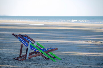 Semi-reclining chair for relaxing on the beach. Popular seaside attractions in Thailand. Beaches that can be traveled throughout all seasons.