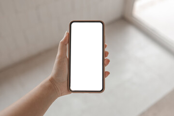 Women's hands holding cell telephone blank copy space screen. smart phone with technology concept