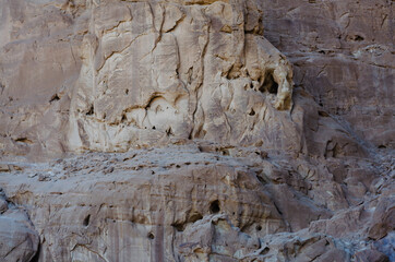surface structure of brown shades of natural stone outdoors in nature