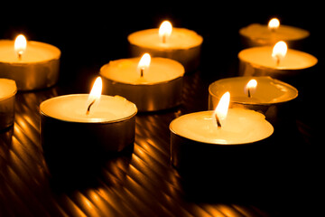 candles that are lit in the dark